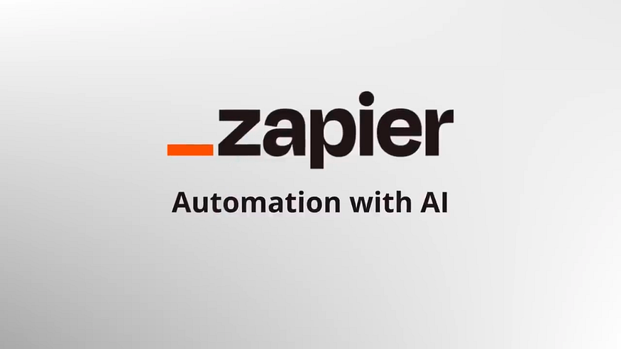 The Zapier logo, showing "_zapier" in black text with a small orange underscore before "zapier." Below it, the text "Automation with AI" is centered. The background is a plain light gray.